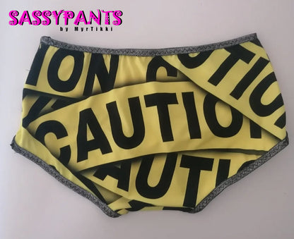 CAUTION alushousut